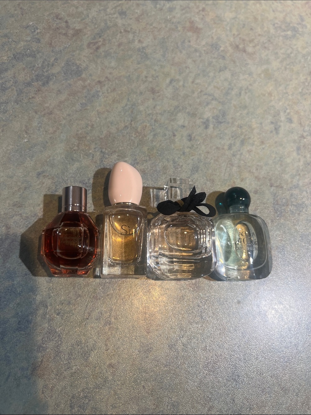 4x L'Oreal miniature collector bottles, no box